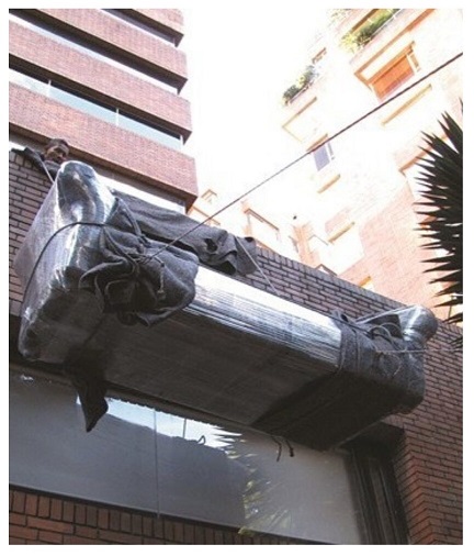 subir muebles por fachada